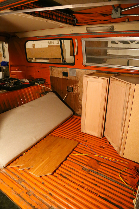 We reupholstered the cushions, and we will be installing these bamboo floors. Here is a test fit on the colors.&nbsp;