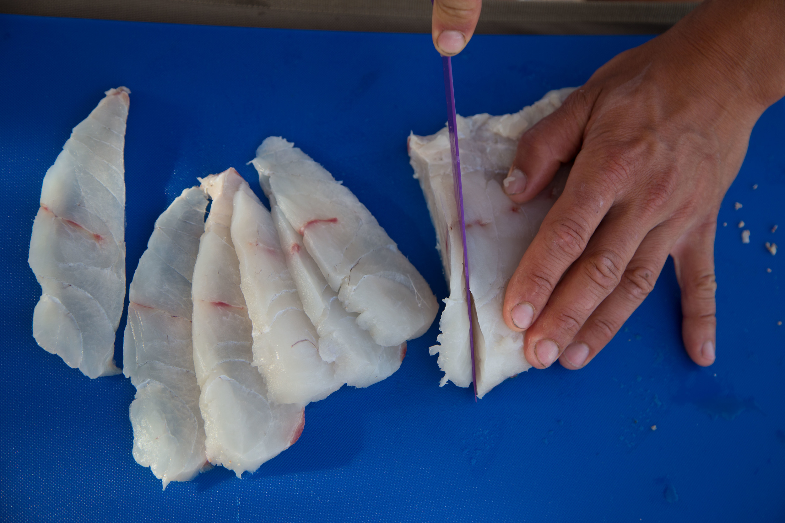 Making ceviche out of grouper.