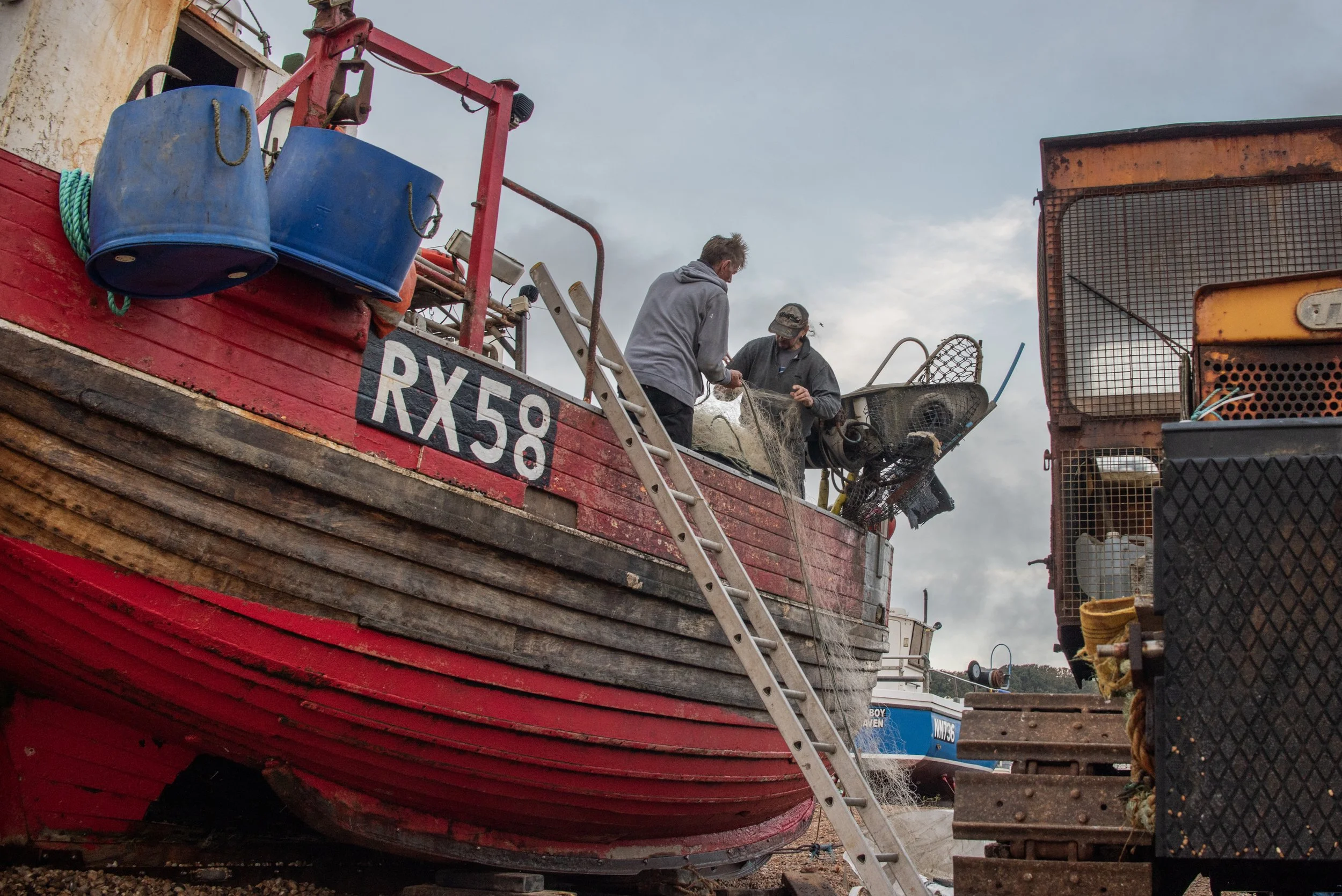 30..Fishermen in hastings checking nets.jpg