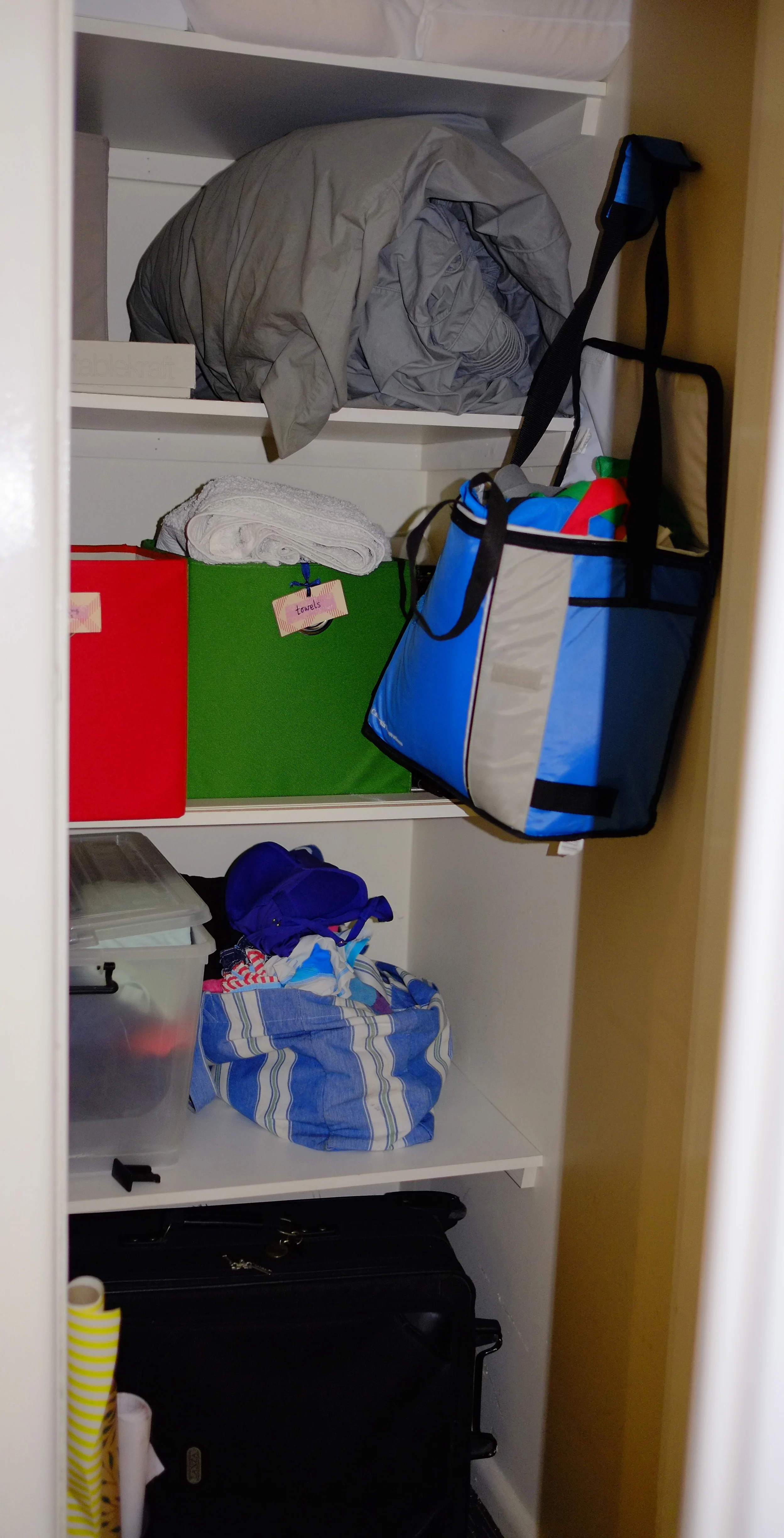 disorganised storage cupboard