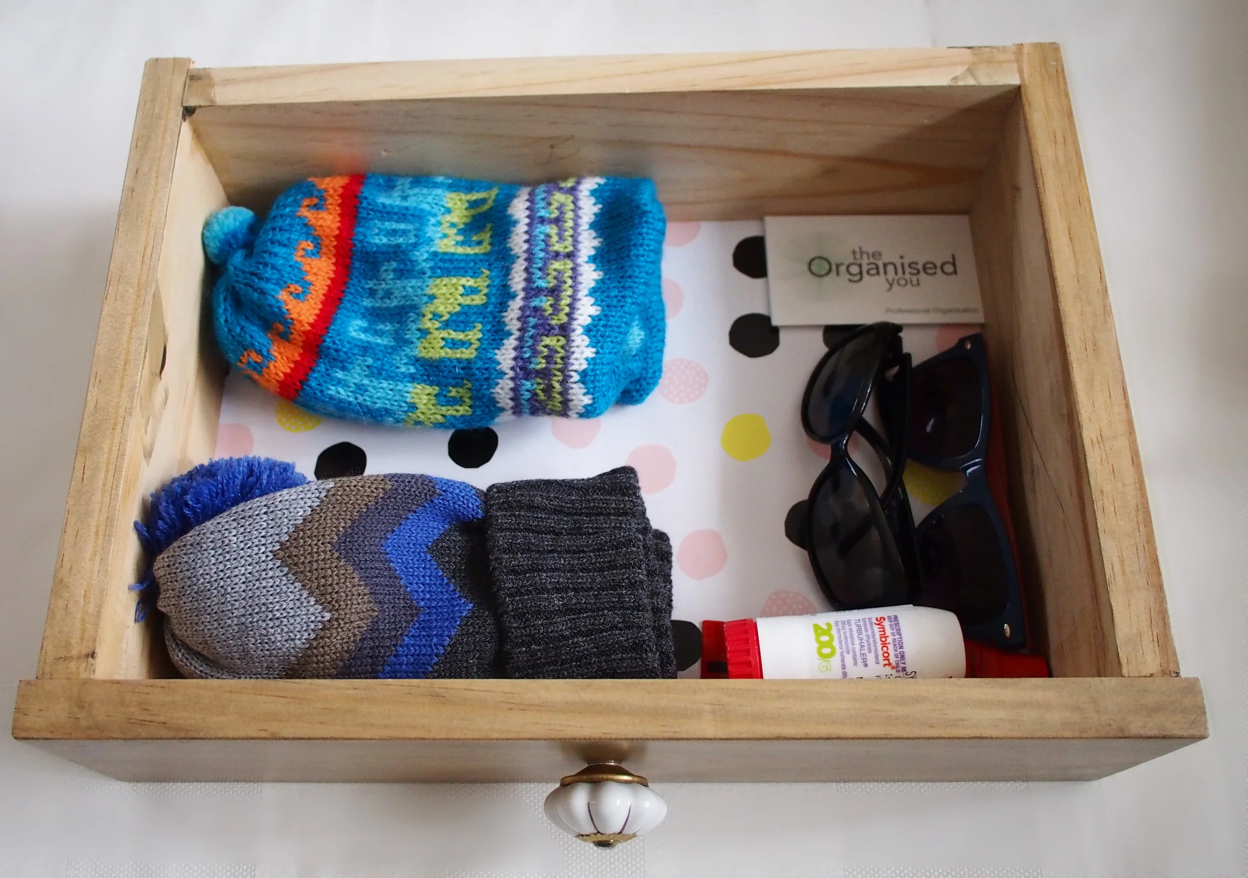 drawer containing kids supplies