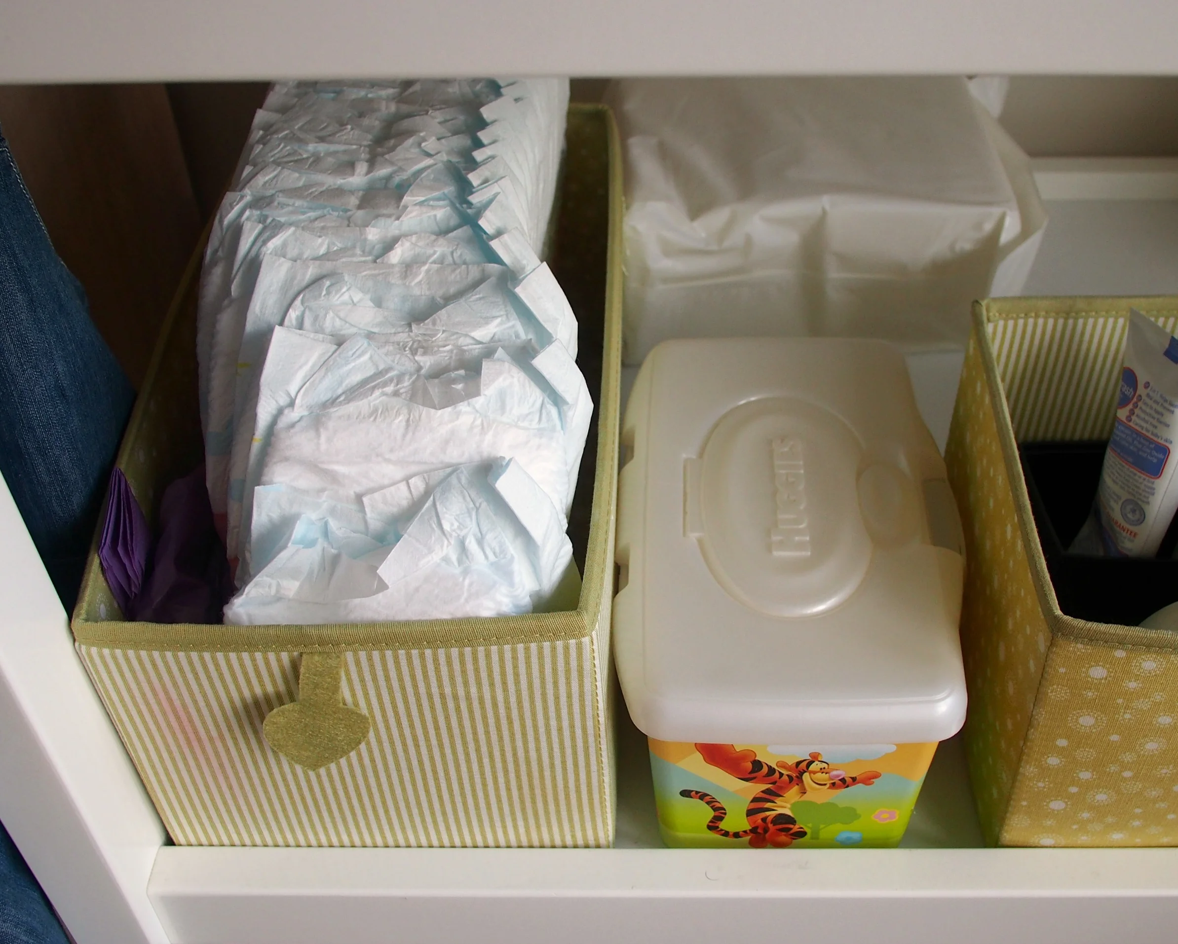 storing nappies on a change table