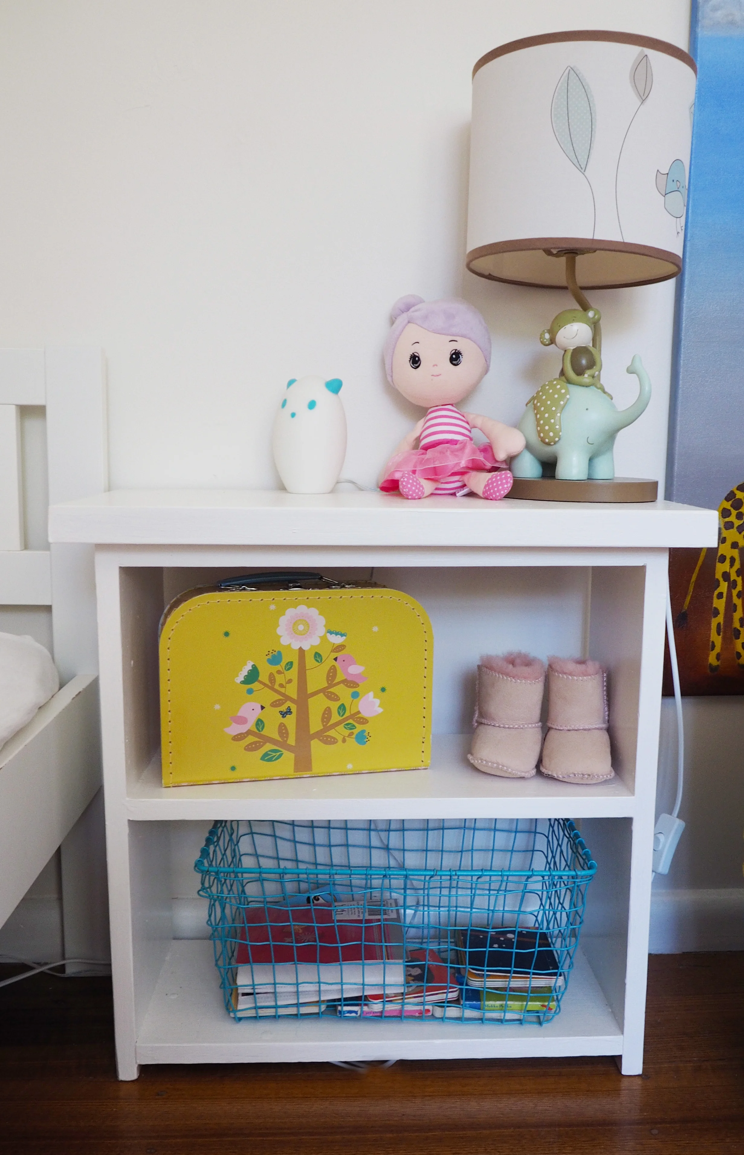 A new child's bedside table - repurposing an old shoe rack into a piece that fits perfectly in the space!