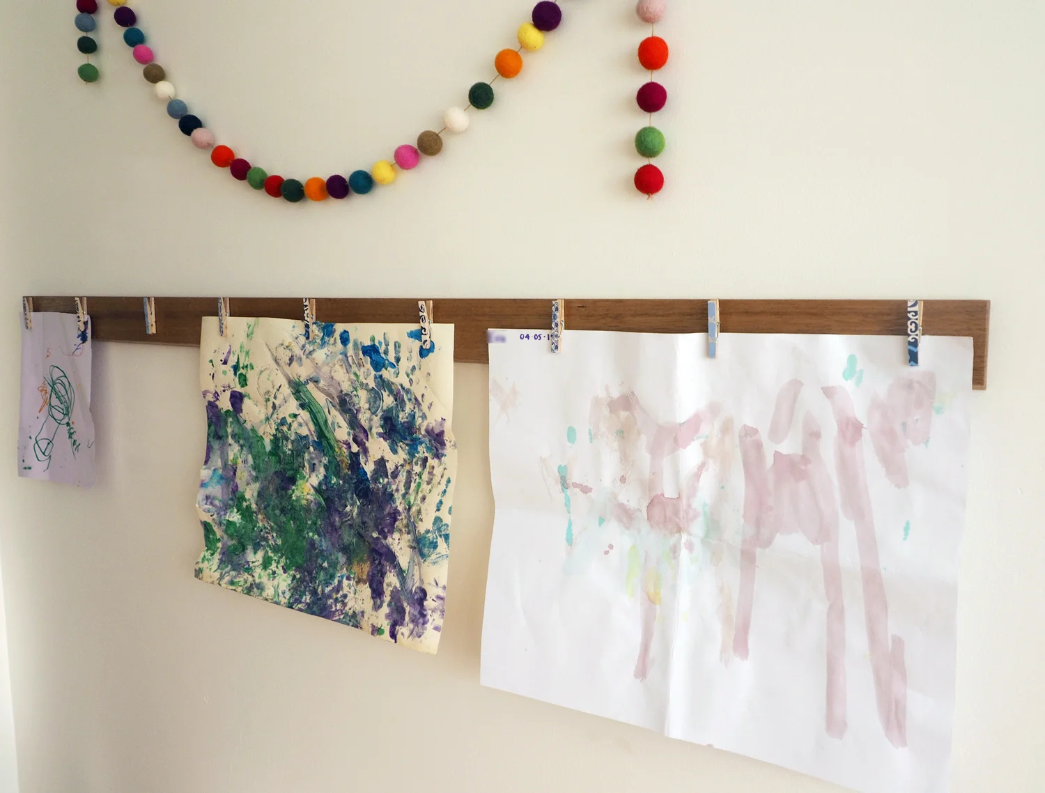 A cute artwork display in a child's bedroom