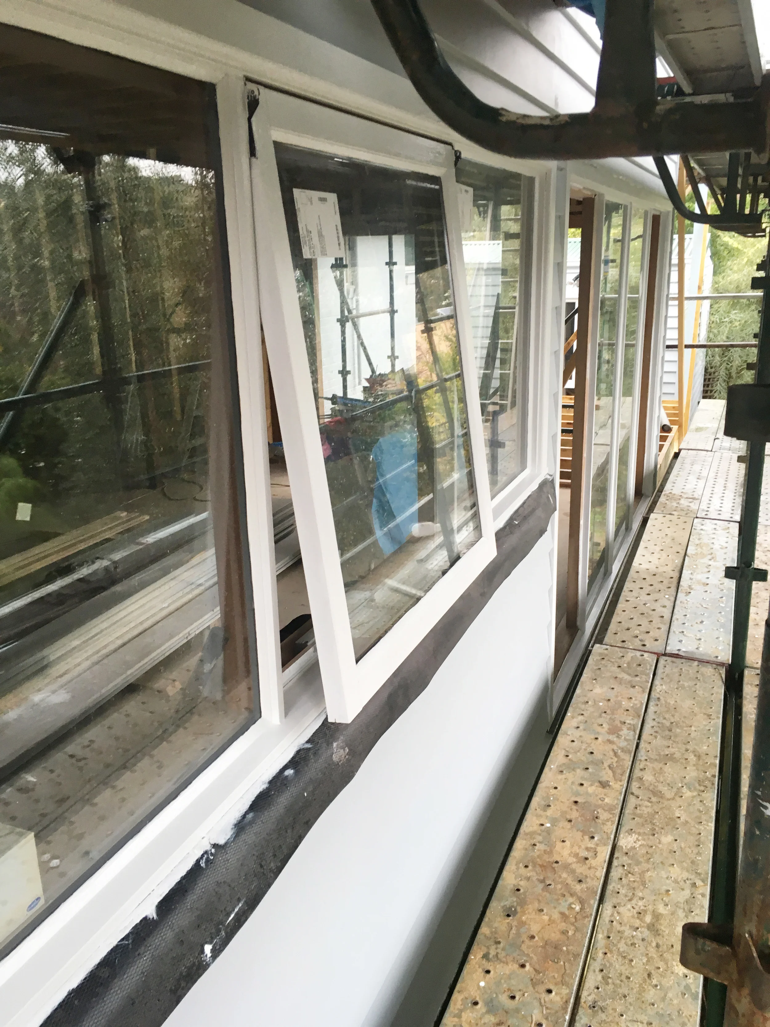 Open windows in between coats of paint to prevent painting the window shut