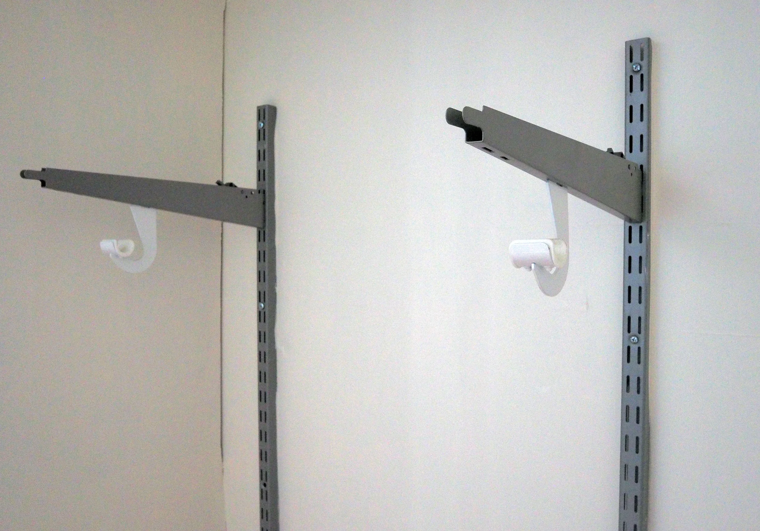 Attaching brackets to the inside of a wardrobe for our son's bedroom makeover - The Organised You