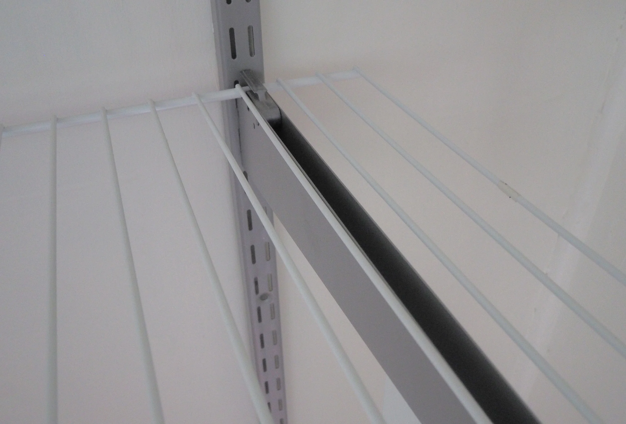Creating storage in a wardrobe - The Organised You