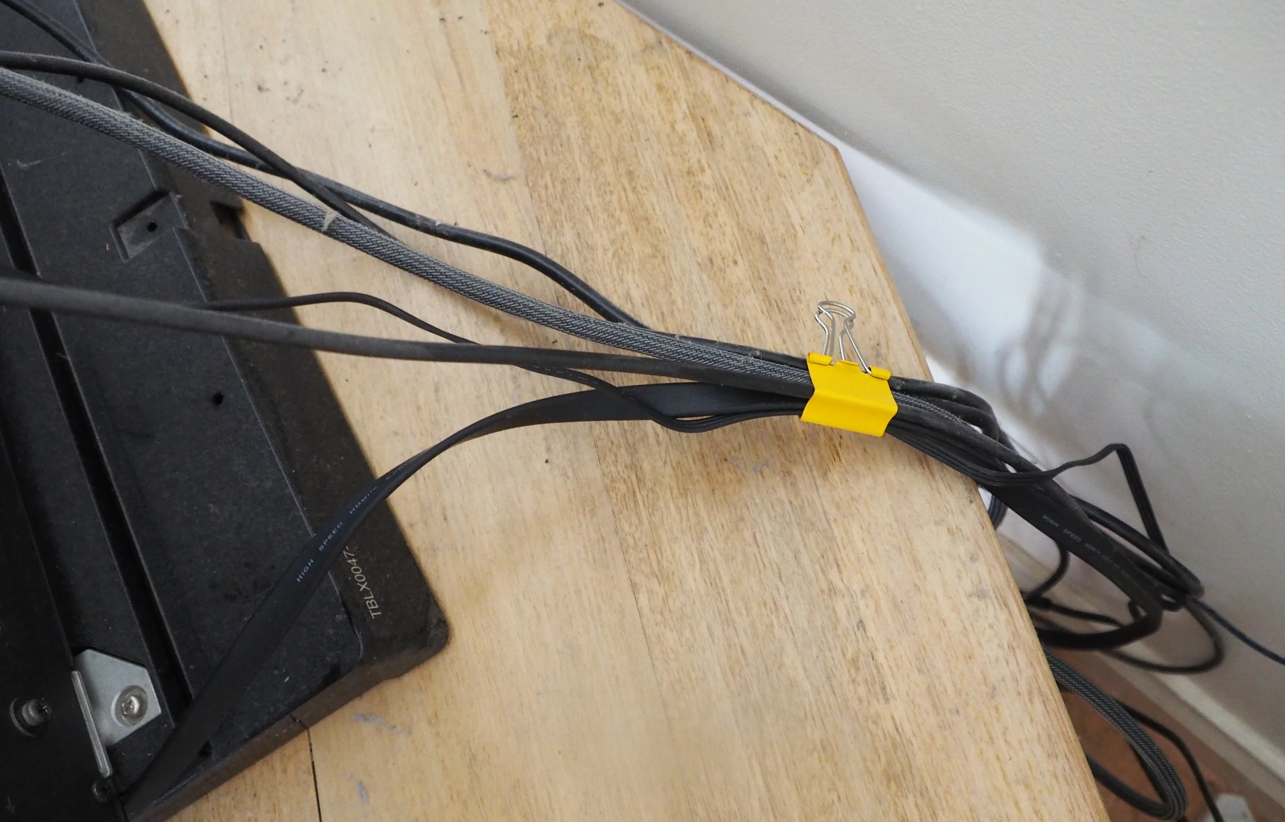 Attach a bulldog clip around cords to keep them neat and organised - The Organised You