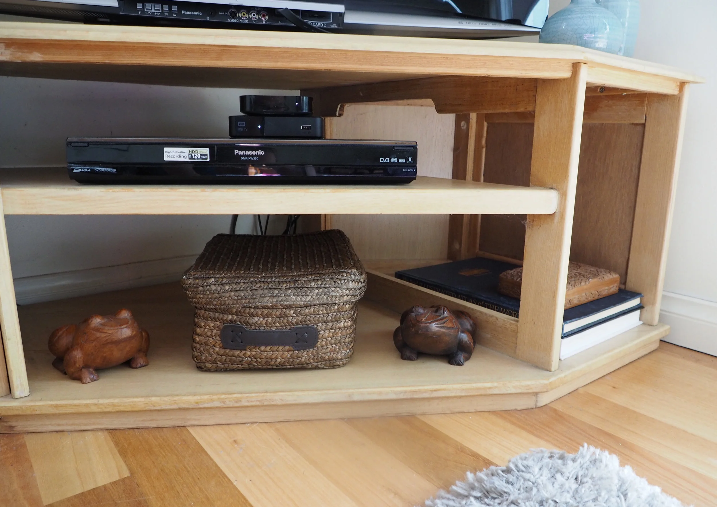 A lidded basket is a great way to conceal clutter - The Organised You