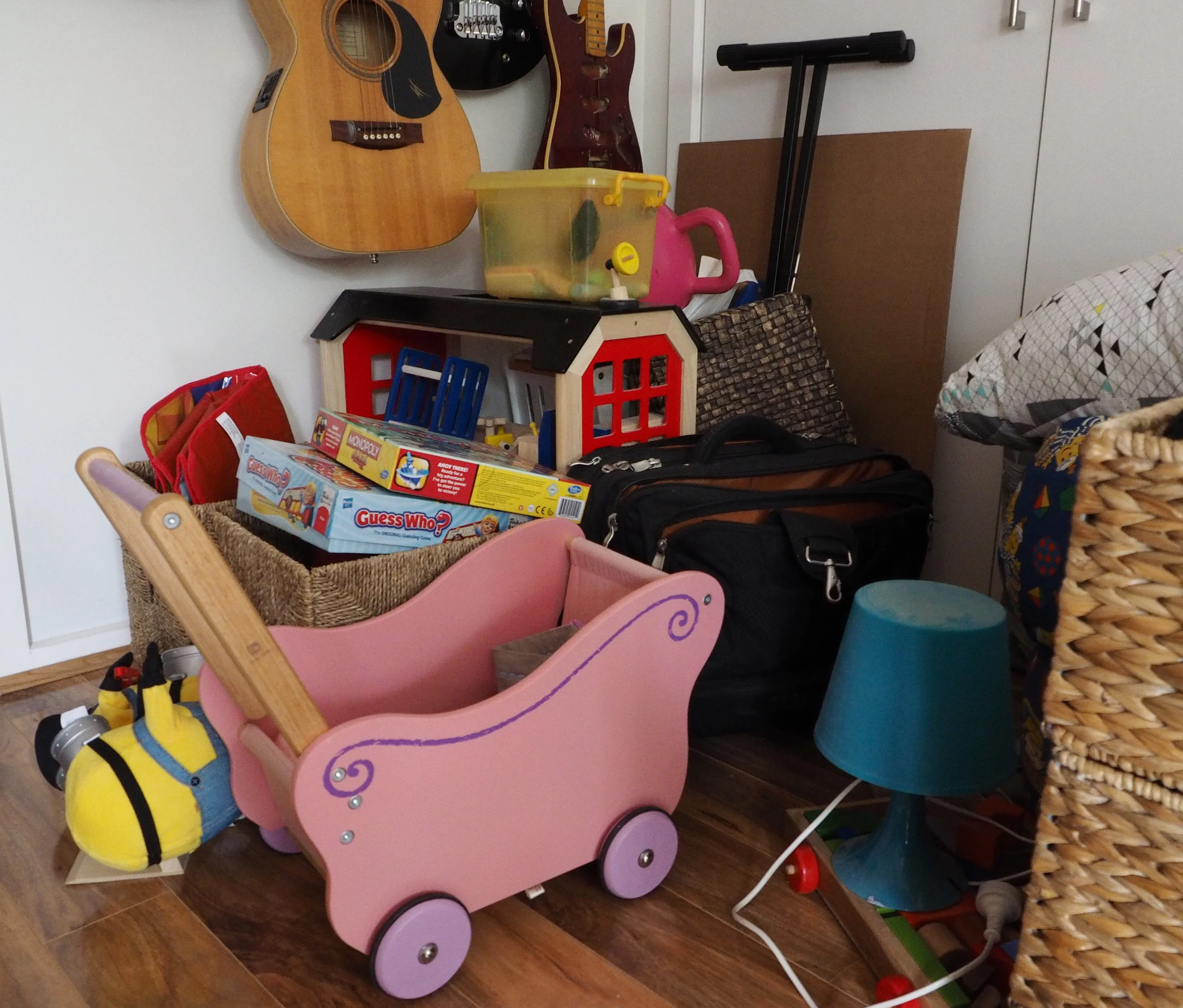 Storing larger toys elsewhere to maximize storage space in bedrooms