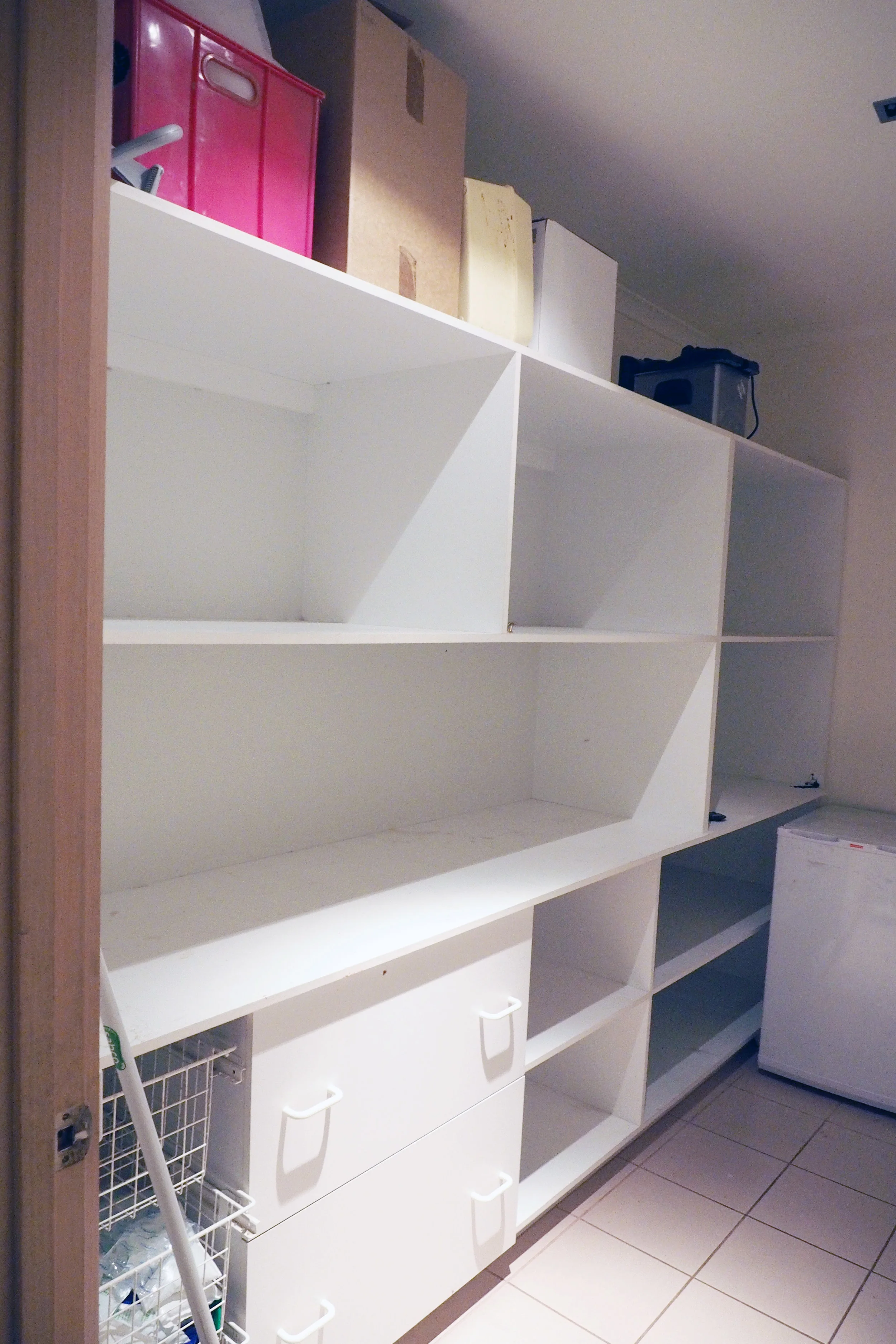 How to organise a pantry - completely empty shelves to create a blank slate {The Organised You|