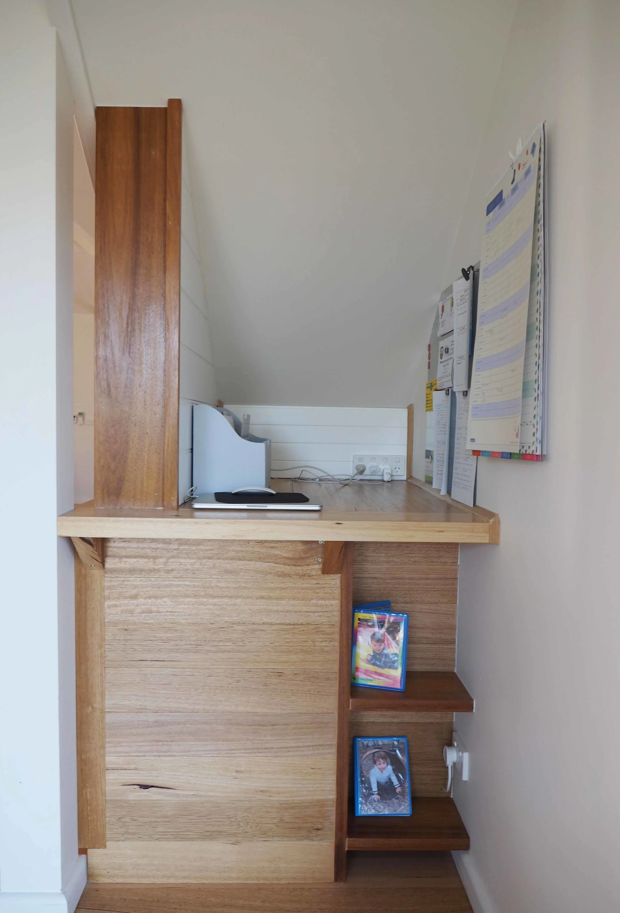 An organised family command centre using vertical space to display important information and calendar {The Organised You}