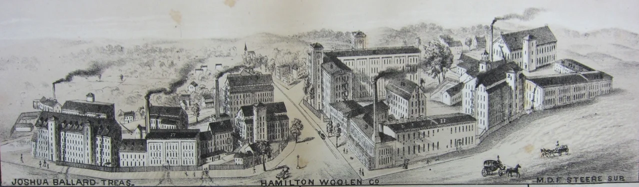 A view of the Hamilton Woolen Co. in 1880. The mills were formerly known as the Salisbury Manufacturing Co. This view is looking south from above Market Street. Market Square is at the bottom center and High Street is at the lower right.
