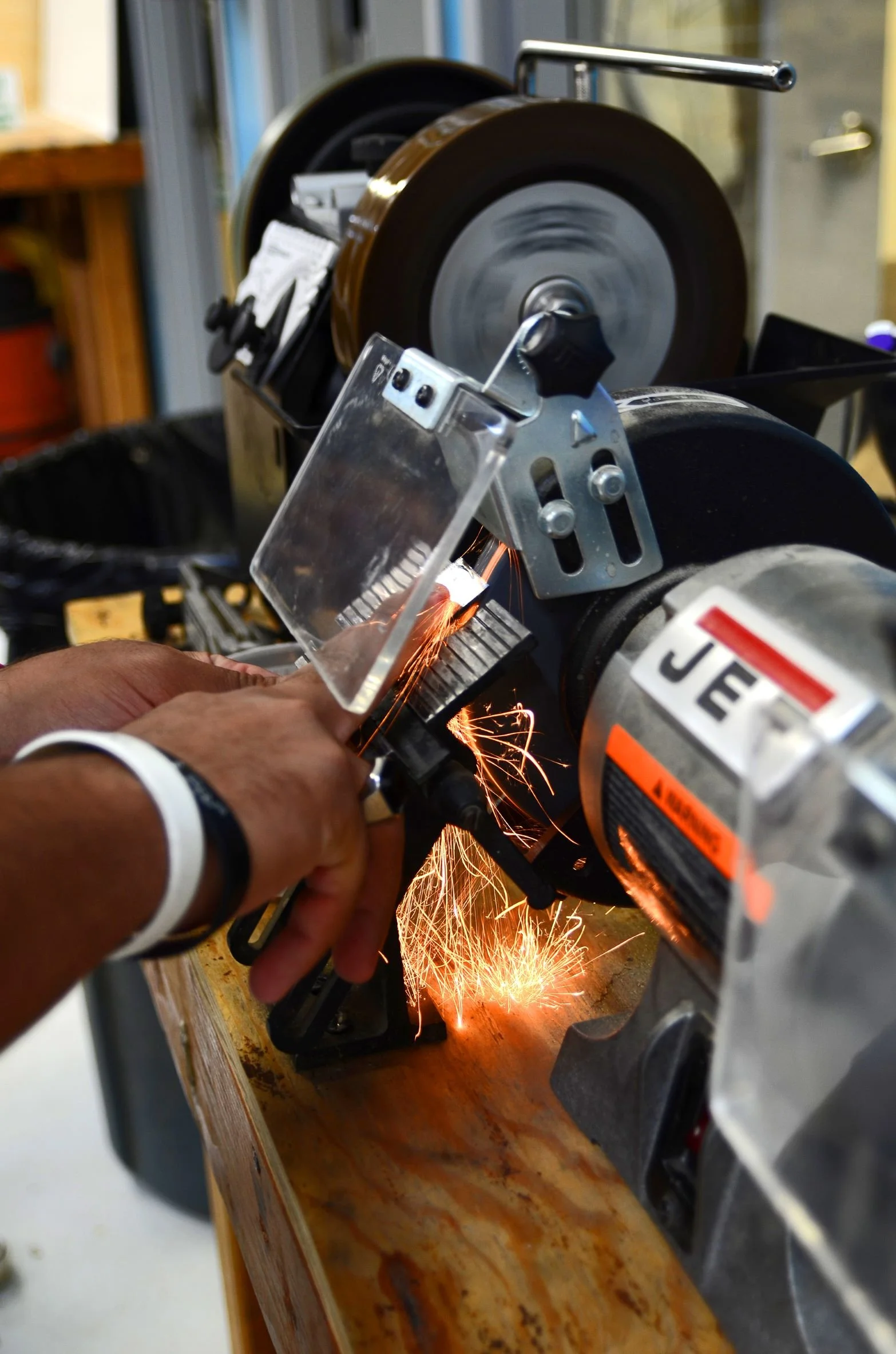 dixon013 Joshua Sharpening a Plane Blade.JPG