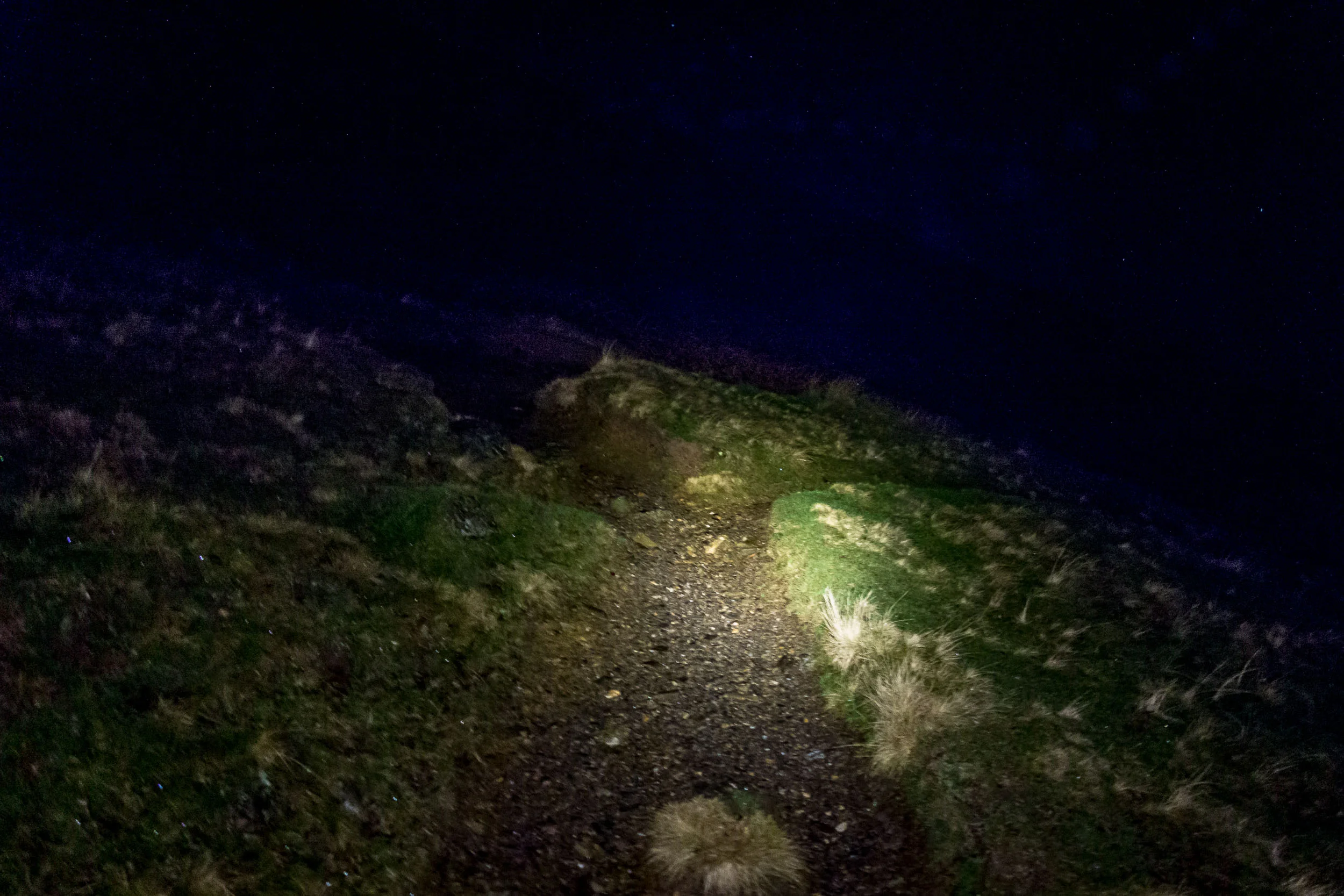 Not the most inspiring image to begin with: heading up by torch-light.