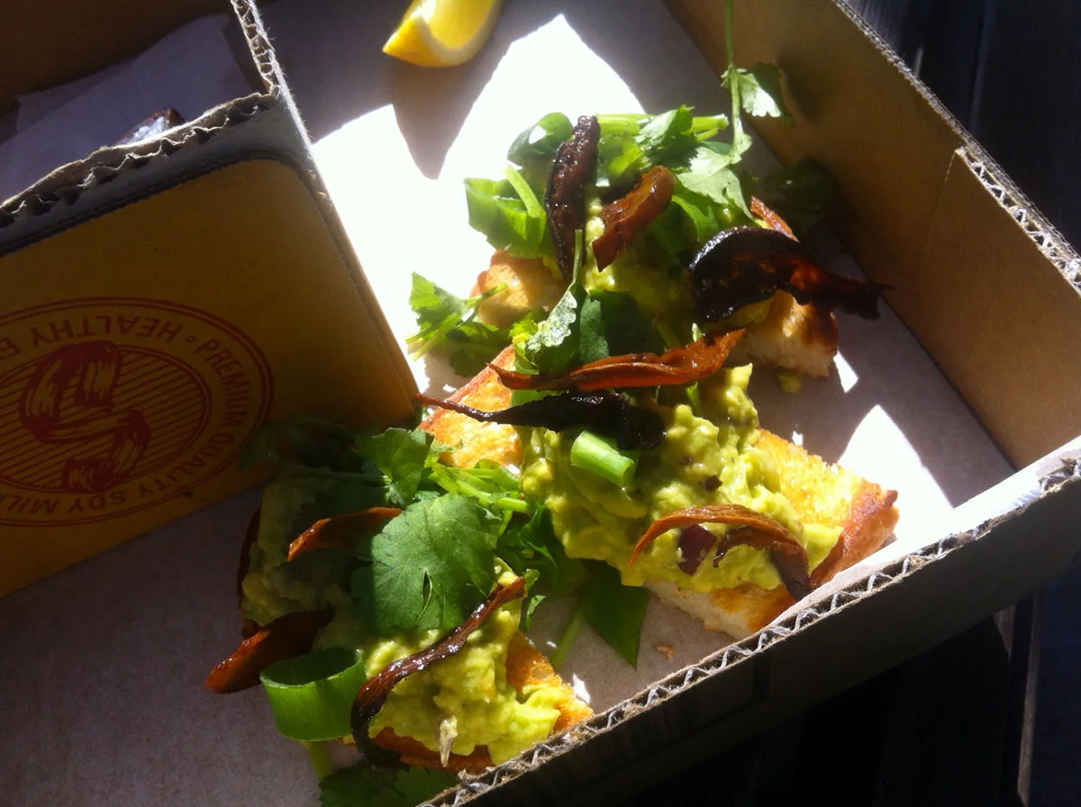  Blue Buddha: Smashed avocado on organic sourdough w/ mushroom bacon strips ($12) 