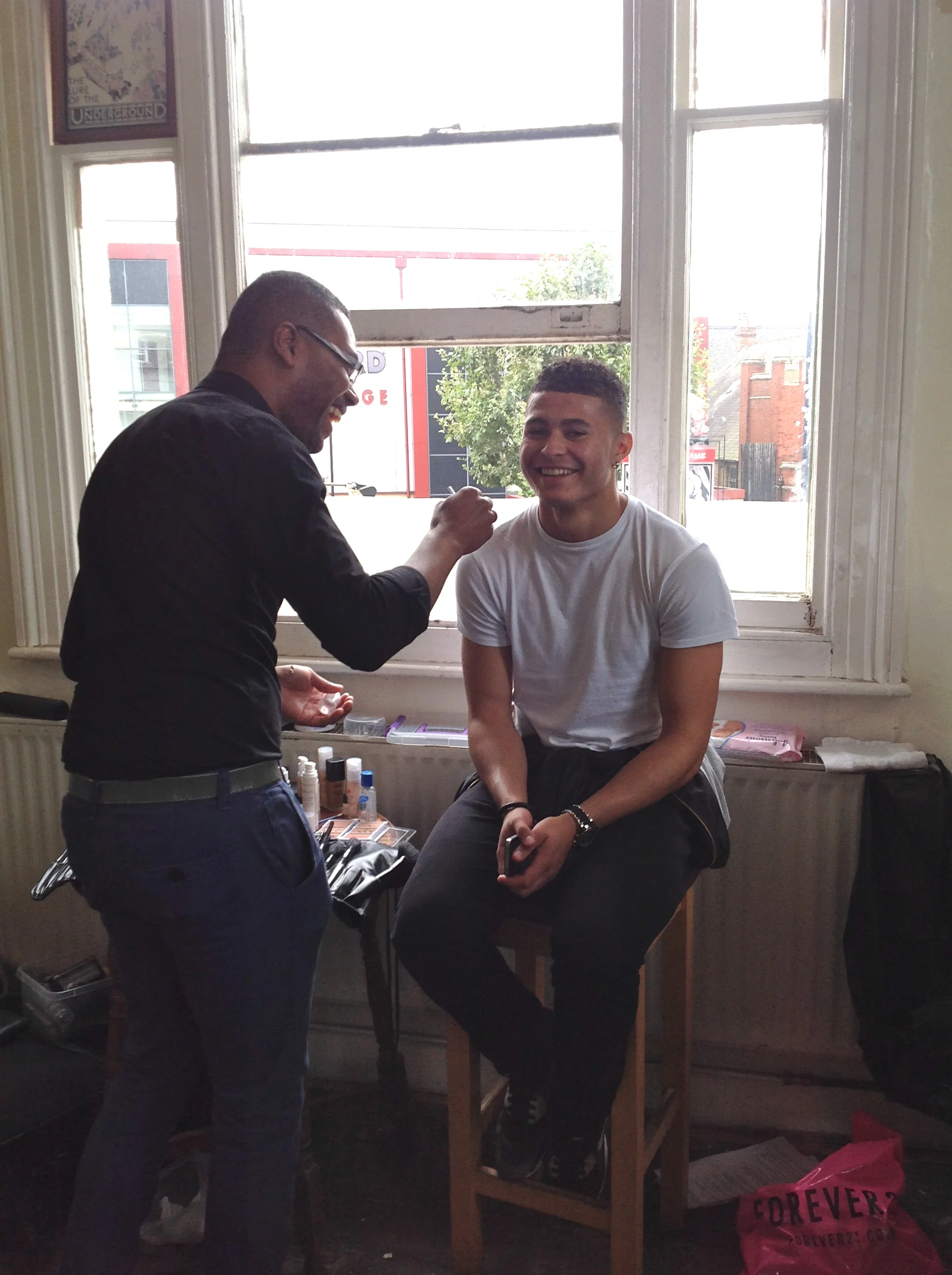 Make-up corner. One of our wonderful volunteer MUA starting to work on model Jordon.