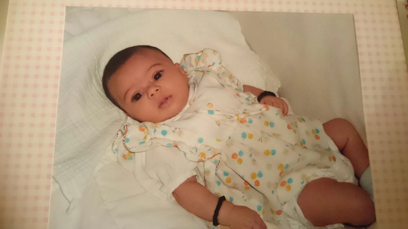 Cute alert! Tiny baby Maya wearing her mothers original vintage nylon dress.