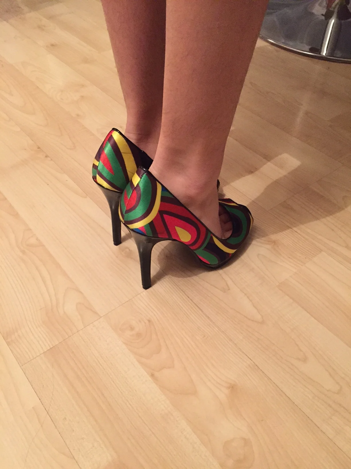 Trying on mum's shoes. 'Only one size or so to go…!'