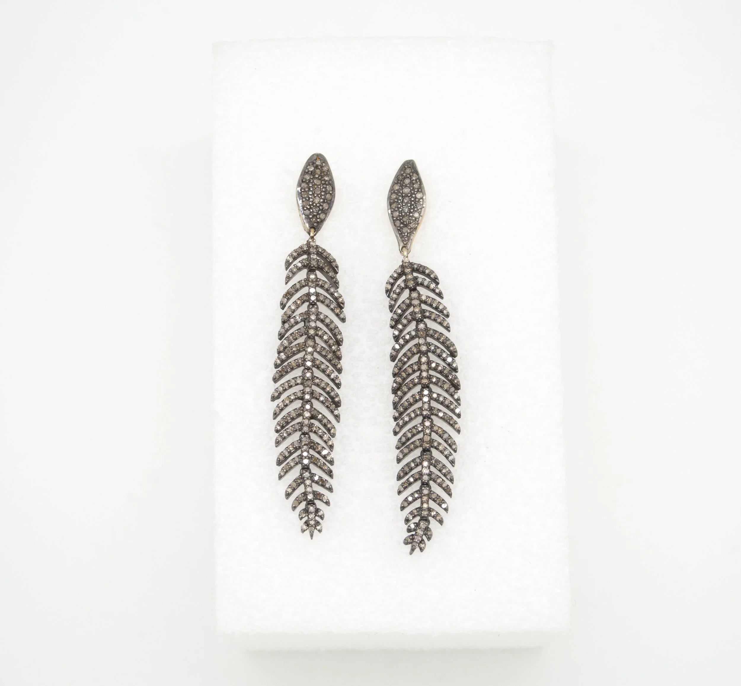 feather earrings small.jpg