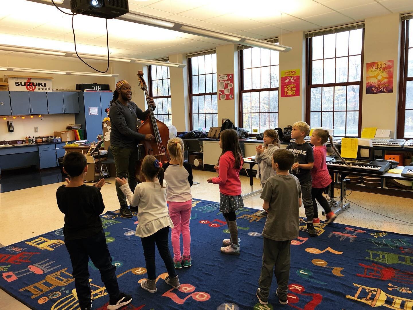 Singing and dancing to Haitian song at HTC Elementary, October 2019.jpg