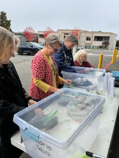 Volunteers with Art For All prepare the luminaria