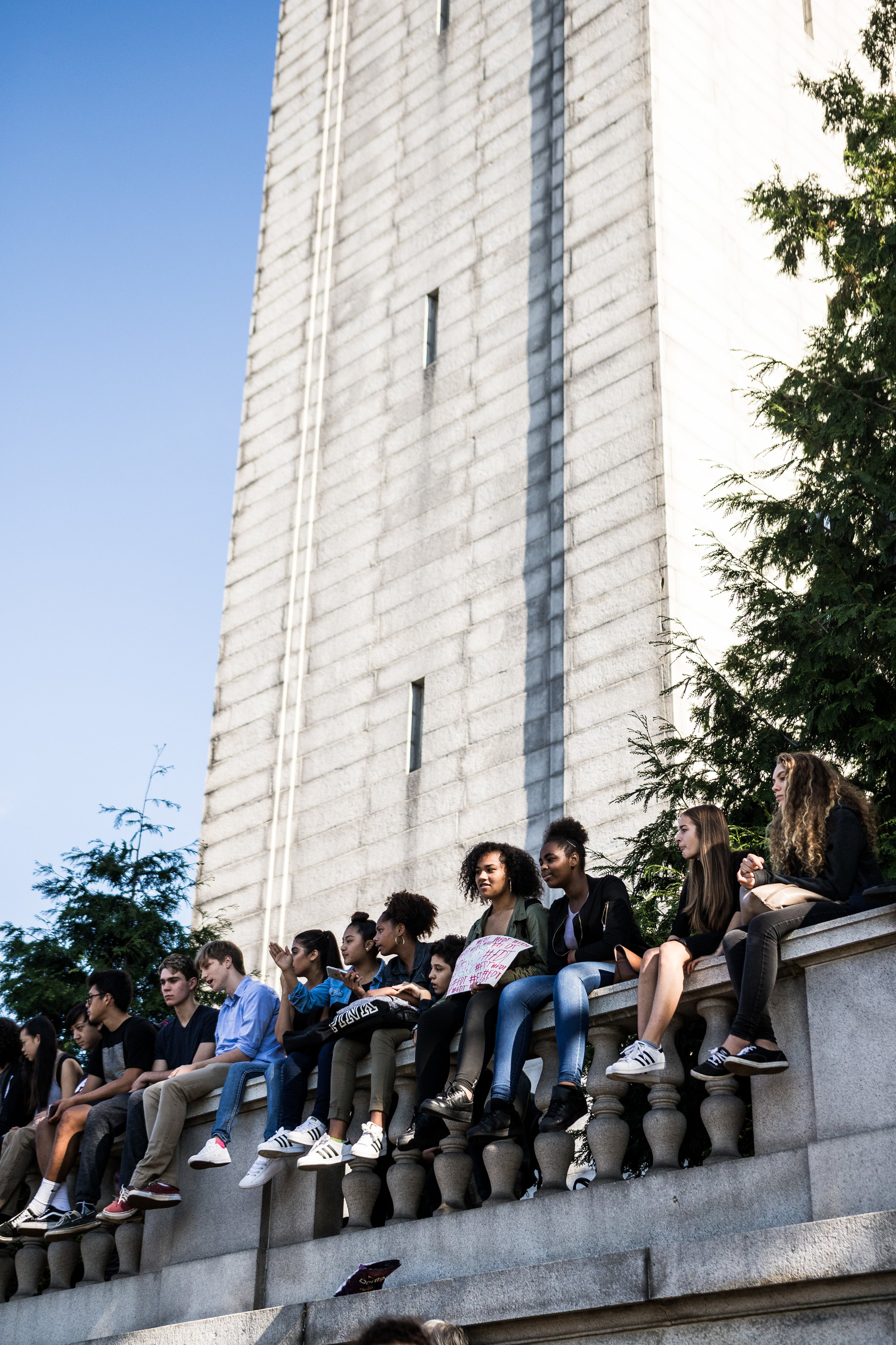 Berkeley-Nov9Rally18-StudentSittingTower1-FullRes.jpg