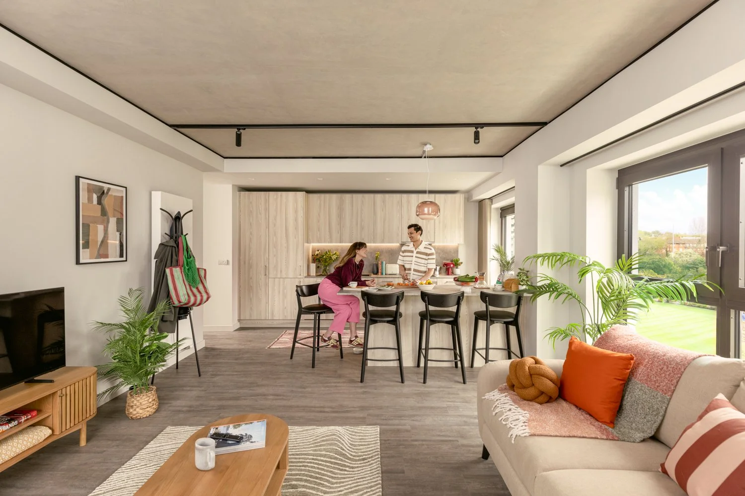  A couple laugh in their new apartment 