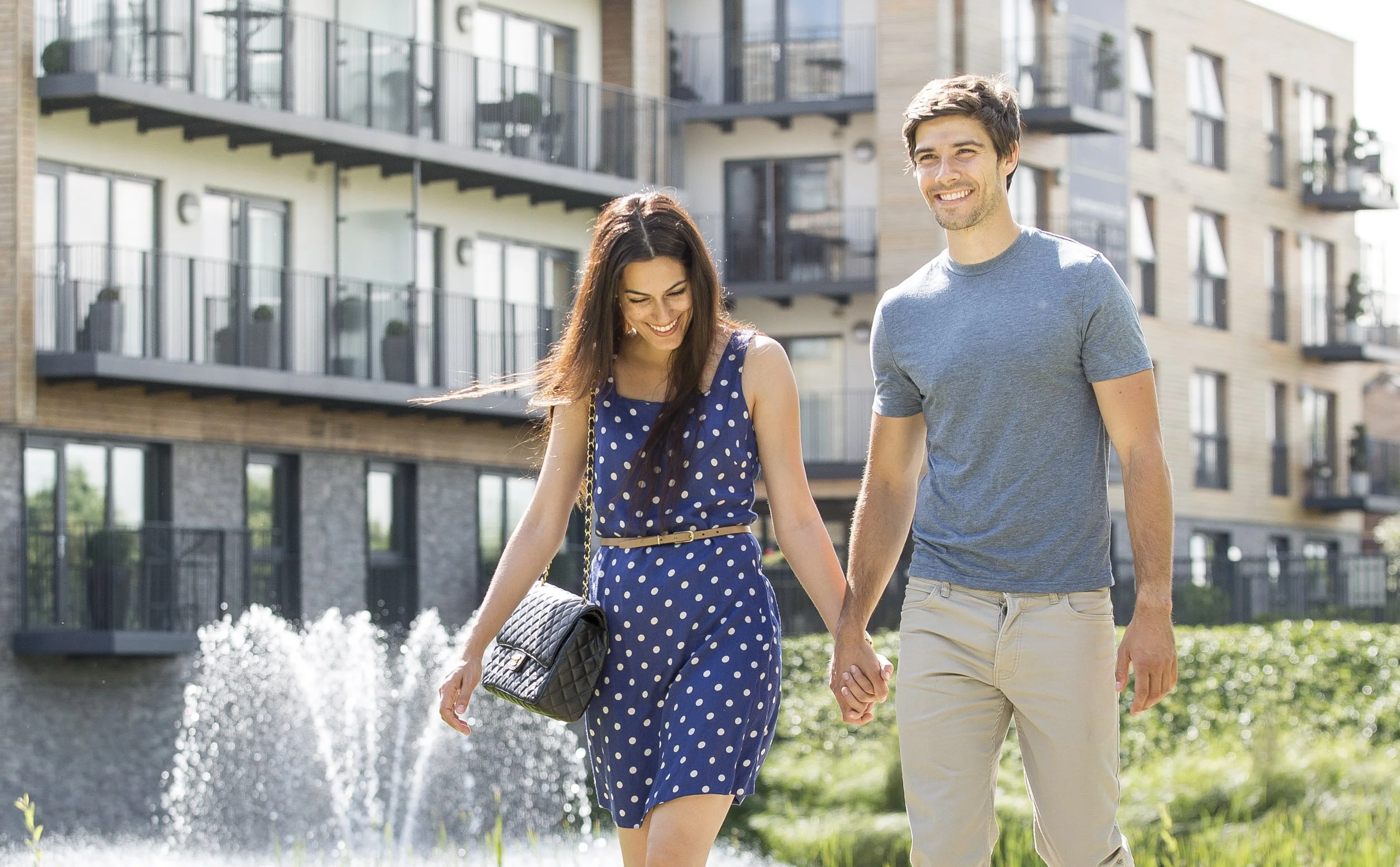  A couple enjoy a walk in the sun 
