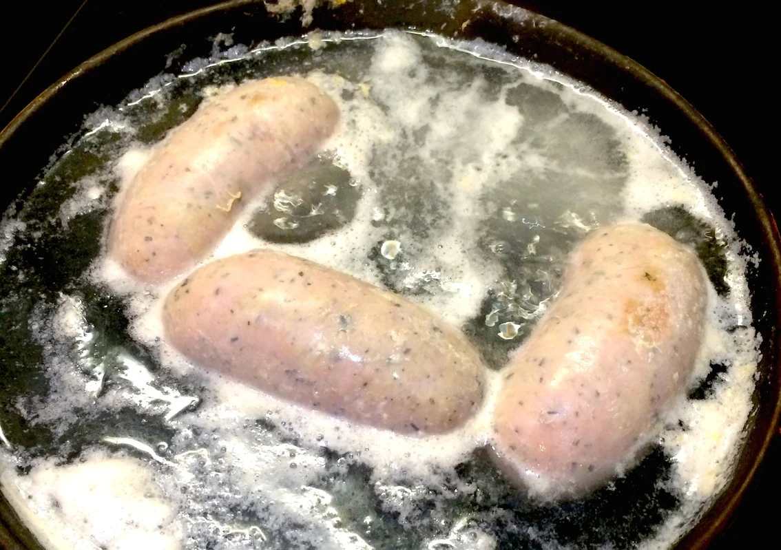 Sausages boiling in water