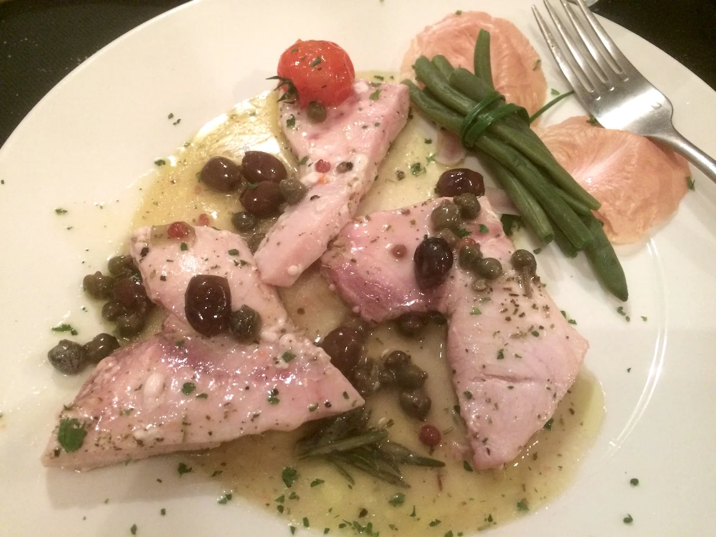 Swordfish with olives, lemon, capers at Alle Testiere