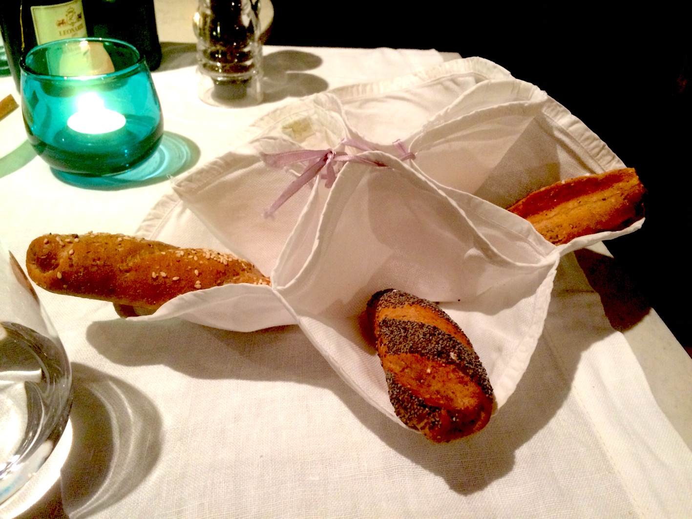 Bread served in a traditional folded and stitched napkin