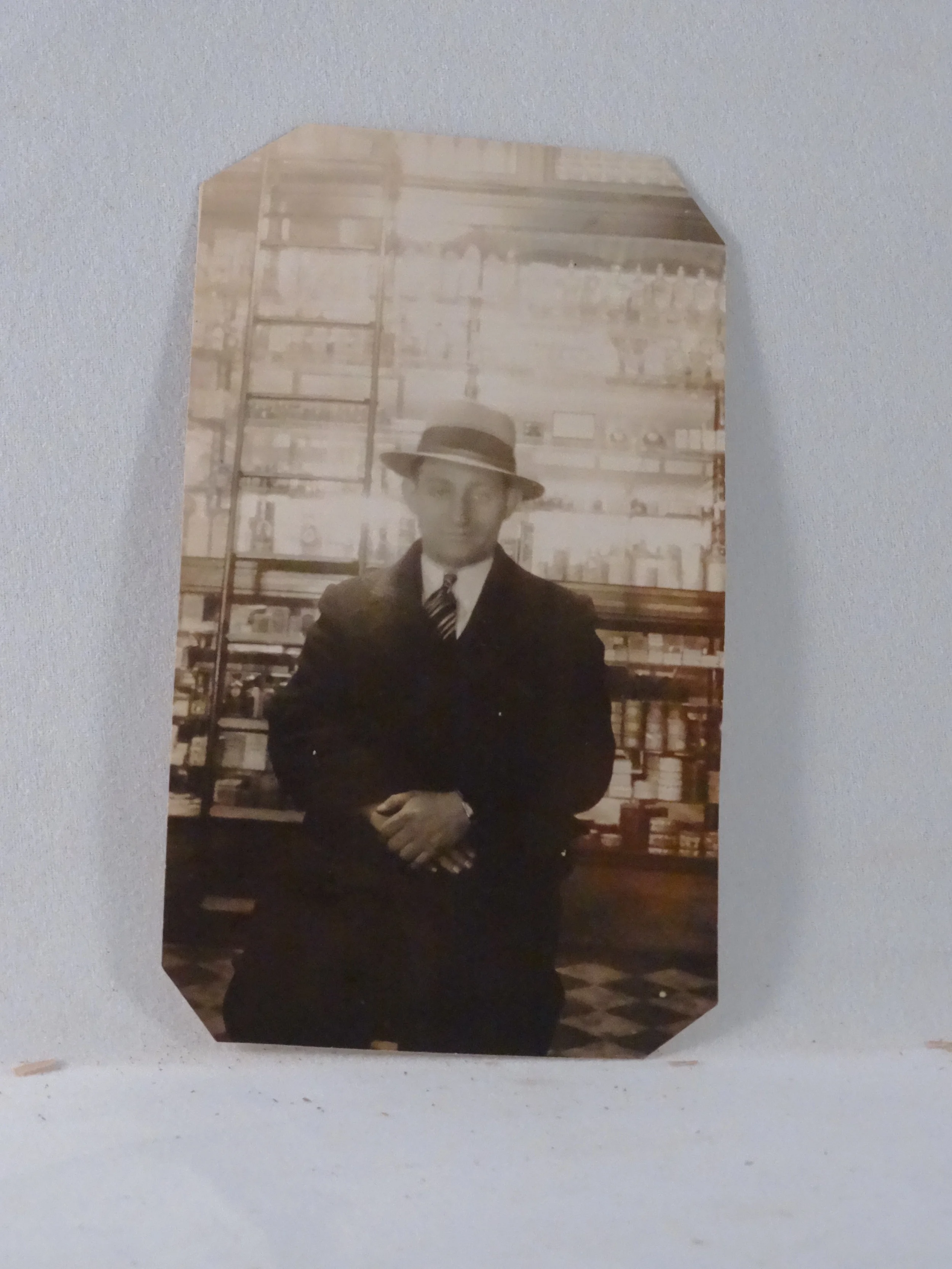 man in hat in drug store