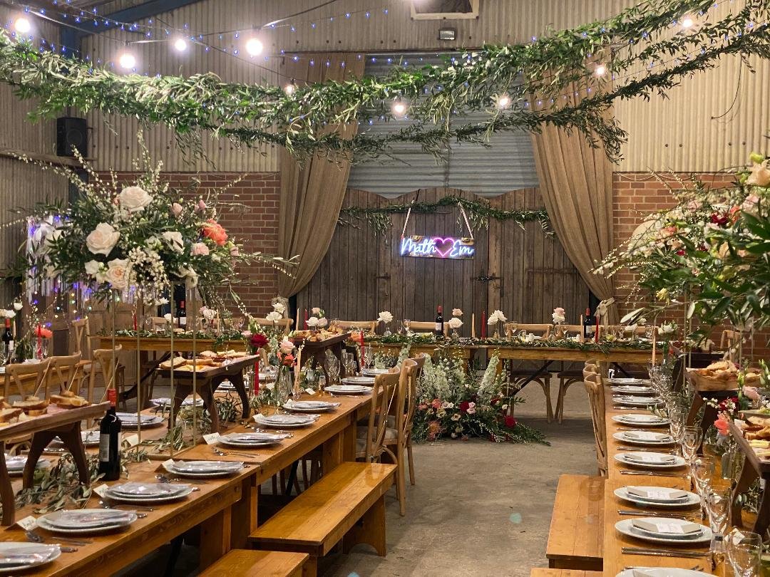 fresh flowers in a barn wedding venue