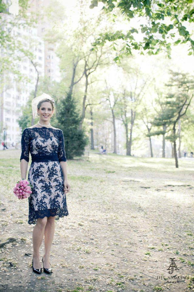 Bride in navy lace custom wedding dress