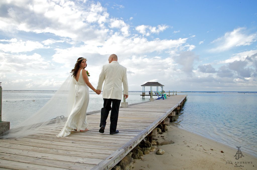 Beach bride in low back wedding dress