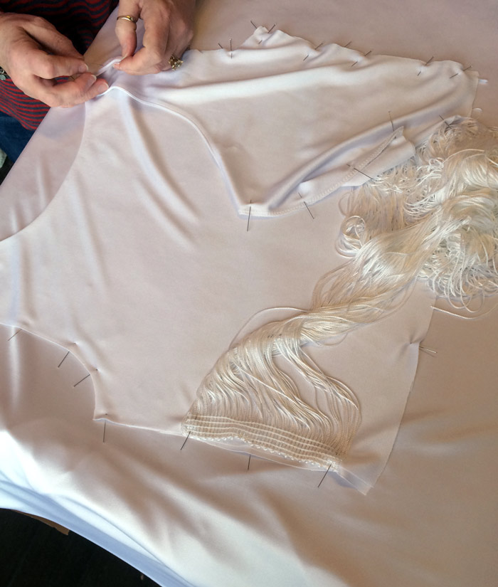 Every dress was made from white silk jersey, a beautiful fabric that moved like water. And we're having a love affair with chain fringe!