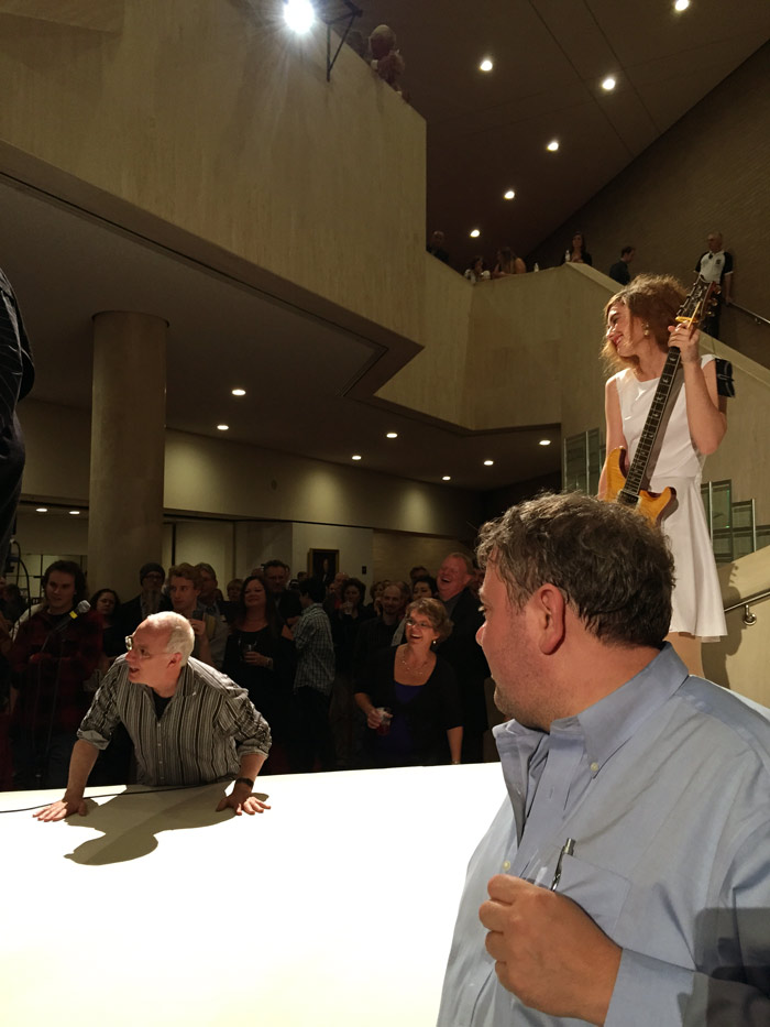 Paul Reed Smith himself, making sure everyone in the room knows just how special the guitar Alyssa is modeling really is!