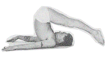 Person practicing yoga in a bridge pose on a white mat
