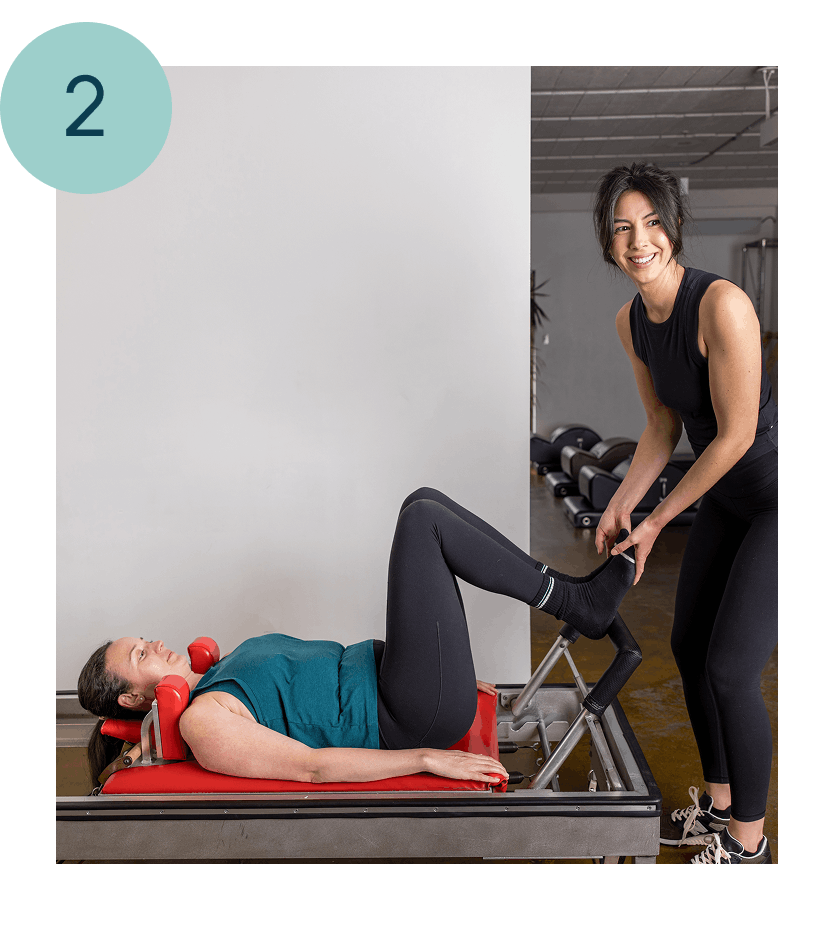 a woman in a pilates class for back pain relief in seattle