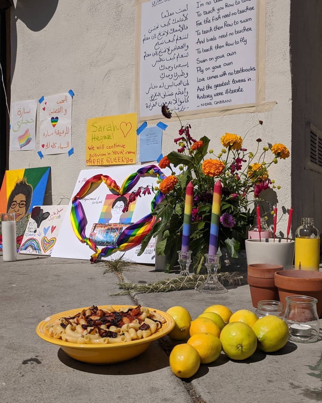 From yesterday's vigil for Sarah Hegazi at the @oaklandlgbtqcenter.
.
The altar became even more filled with tributes from dozens of attendees who came to pay their respects, grieve, and hold one another.
.
There is such power in international solida