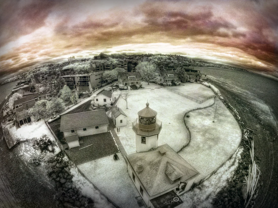   "The earth is beautiful, bright, and kindly; and the earth is also terrible, and dark, and cruel."   -Ursula K. LeGuin   Alki Point (in Seattle) from an IR-converted camera lofted overhead on a kite-string. 