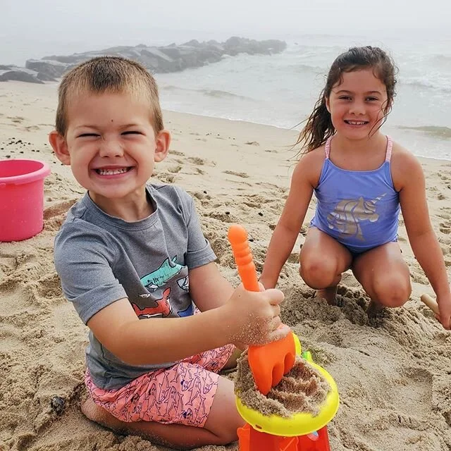 I dont know how much longer I'll be able to lug my large self across the sand, but for now we are soaking up every second, sun or clouds.