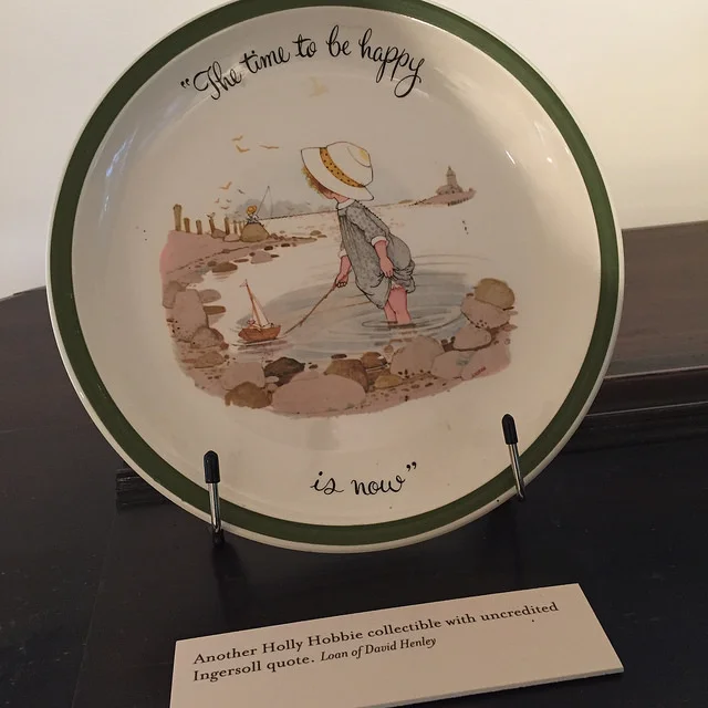 A Holly Hobbie collectible with an uncredited Ingersoll quote