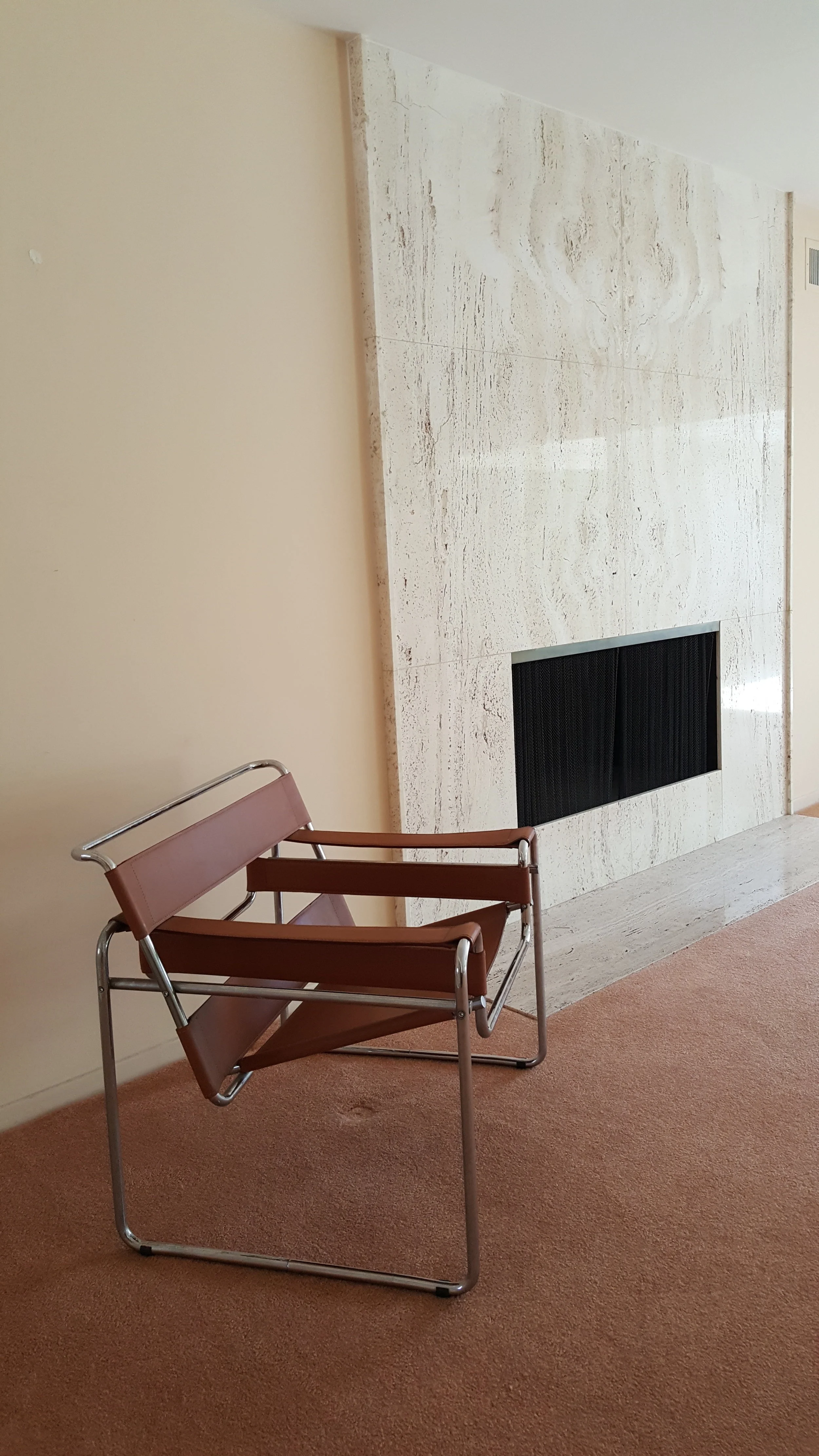 STONE FIREPLACE AT LIVING ROOM