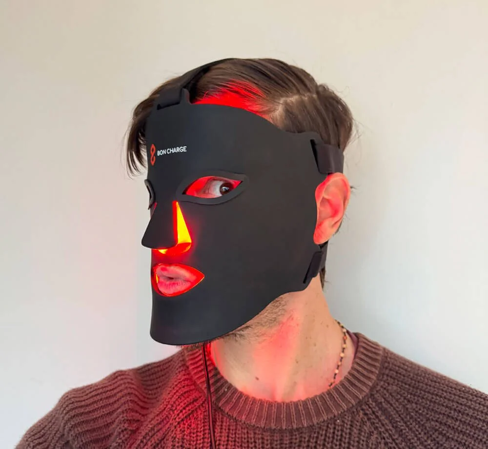 Nick wearing Best red light therapy mask by Bon Charge