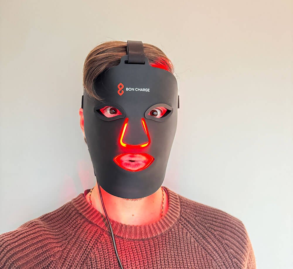 Nick wearing Best red light therapy mask by Bon Charge