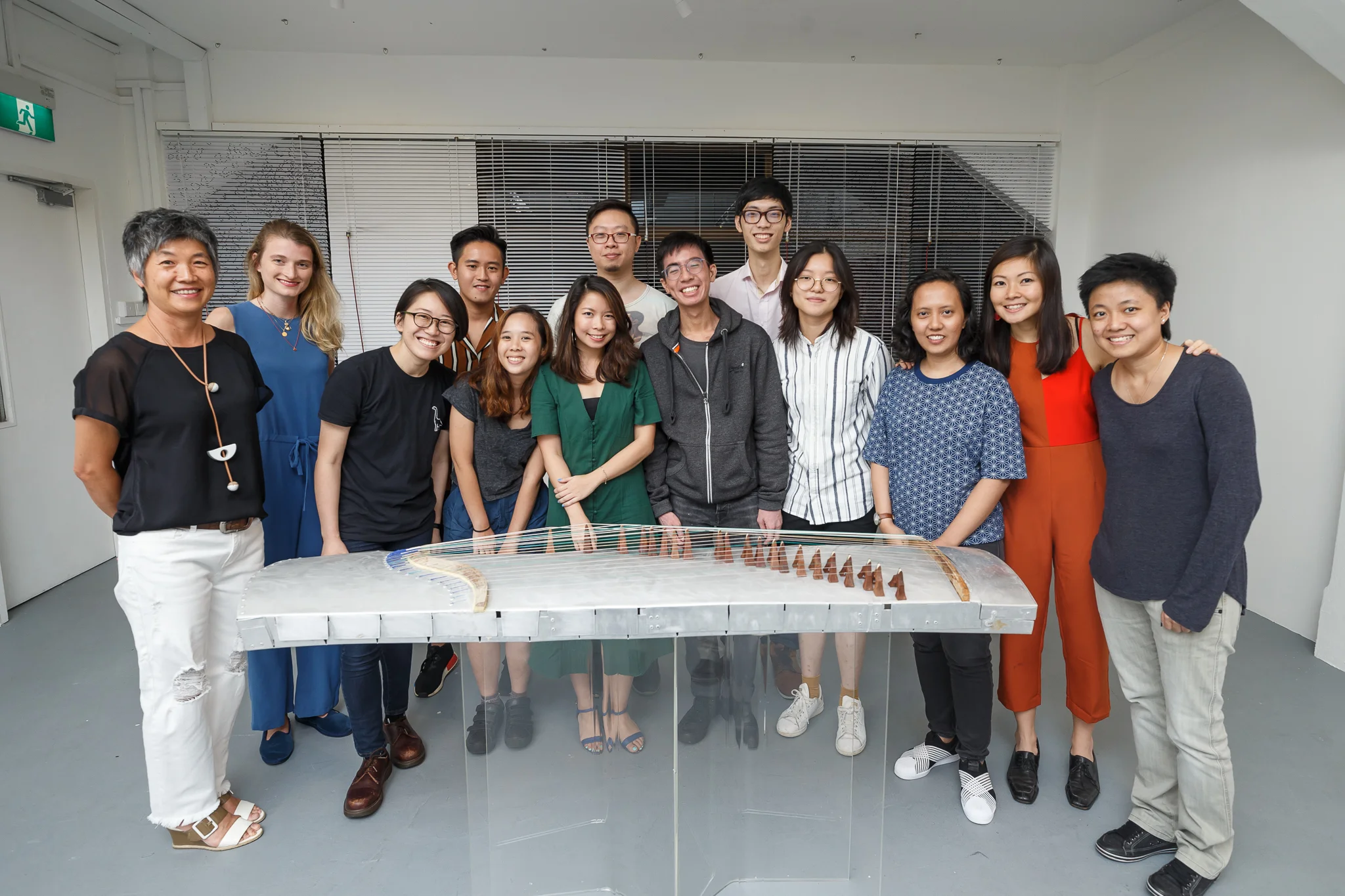 Group photo with artists and team