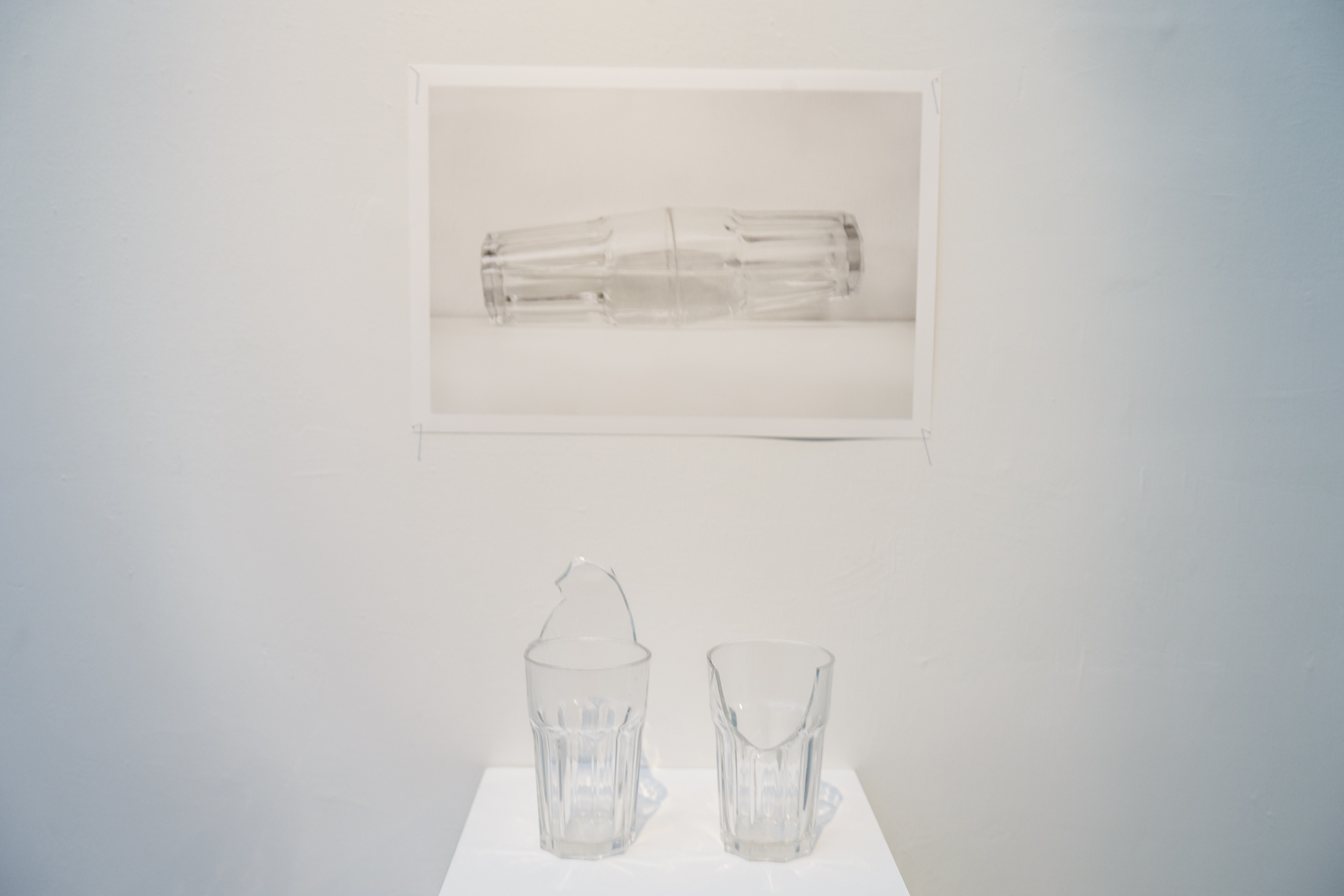 Daniel Chong, A broken kiss, 2018, Broken glass cups and glue adhesive