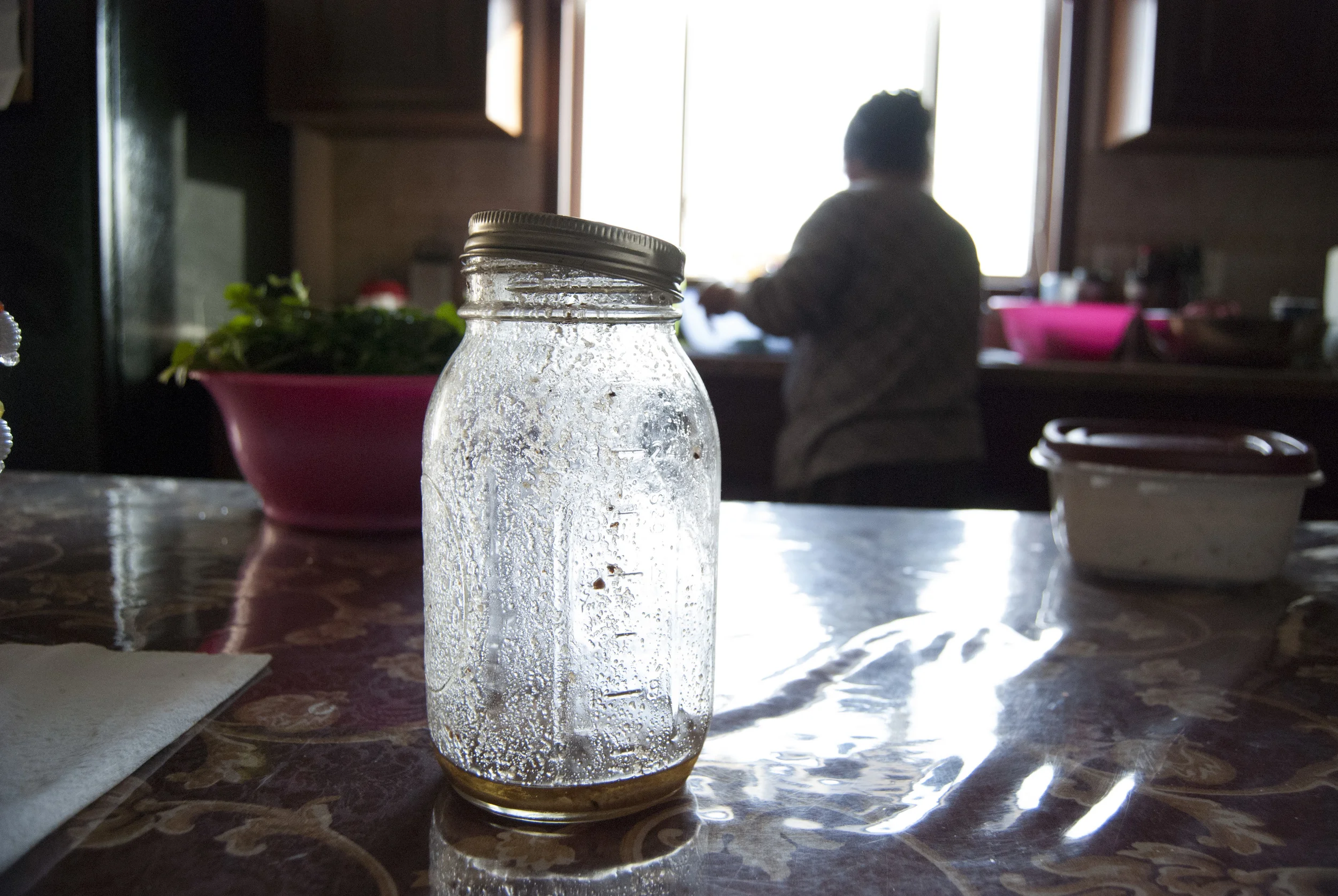  While she has the ingredients still fresh from her backyard, Song makes her own salad dressing. A mix of eggs, cucumber, kale and chile tomato stick to the sides of the nearly empty jar.&nbsp; 
